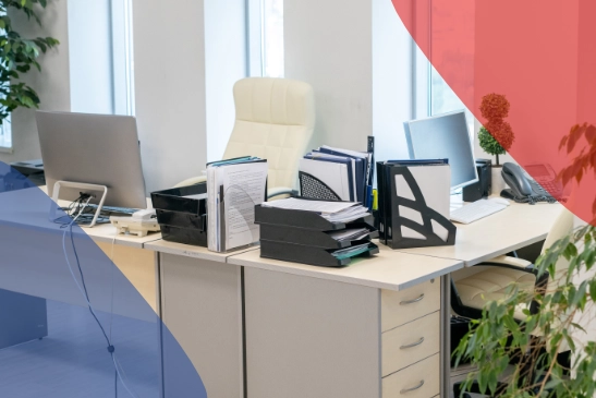 Modern office with desks, computers and supplies