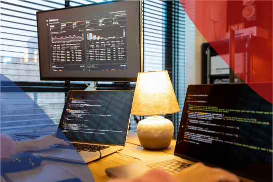Programmer writing programming code at home workplace